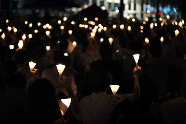Community candlelight vigil in memory